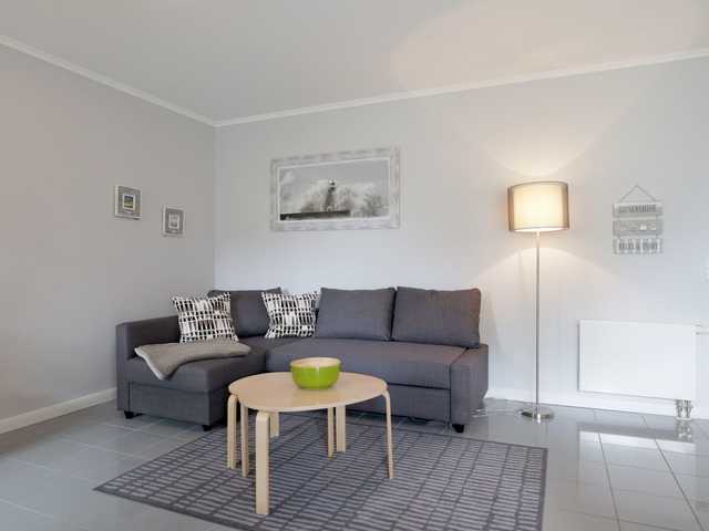 Villa Sonnengarten App.3- Wohnbereich mit Sofa