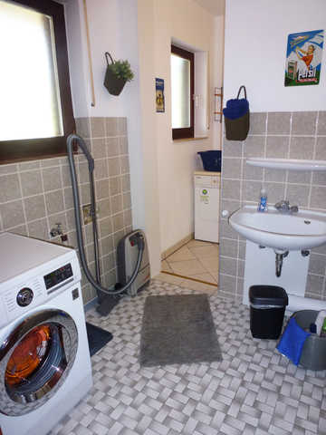 Unser Waschraum mit Waschmaschine und Trockner