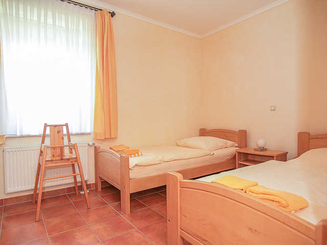 Das zweite Schlafzimmer mit zwei Einzelbetten