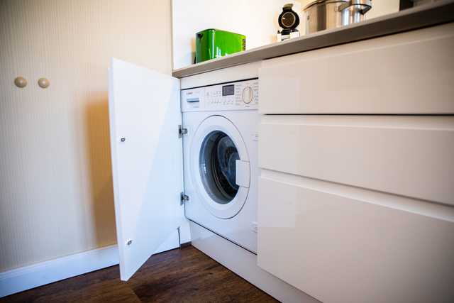 Waschmaschine in der Küche im EG