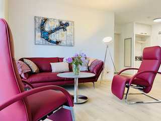 MeerZeit / Villa Düne Wohnzimmer mit Relax-Ledersesseln