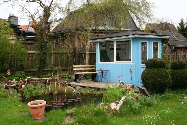 Gartenpavillon mit Teich